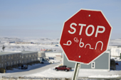 Stop sign in English and Syllabics in Iqaluit. Arctic Canada. Nunavut. 2008