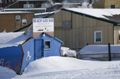 The Beach Gas Bar in winter with snow blocking the doorway. Iqaluit. Nunavut. Canada. 2008