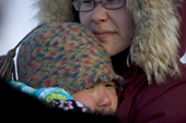Renee and her daughter Sarah Jane Qulaut share a moment at Hamlet Day. Igloolik. Nunavut, Canada. 2008