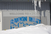 Welcome to Rankin Inlet sign on the Hamlet office, with snow and Icicles. Nunavut. Canada. 2008