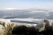 A large sewage lagoon in the winter on Igloolik Island. Nunavut, Canada. 2008