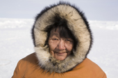 Kanguk (Eunice) Palluq from Igloolik, warmly dressed in a parka while out on a hunting trip. Igloolik, Nunavut, Canada. 2008