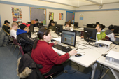 11th Grade Inuit students search the internet for information on climate change during a computer class at the school in Pangnirtung. Nunavut, Canada. 2008