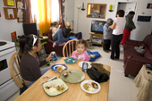 The Metuq family at lunch time at their home in the Inuit community of Pangnirtung. Nunavut, Canada. 2008