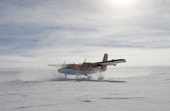 Antarctic Logistics & Expeditions' Twin Otter aircraft landing to re-supply 2009 Monaco Antarctic Expedition at 89 degrees South.