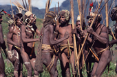 Yali warriors, with painted faces, dance at a feast. Seng Valley, Irian Jaya, Indonesia. 1990