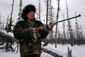 Andrei Dulubchin, an Evenki man out hunting in the taiga. Evenkiya, Central Siberia, Russia. 1997