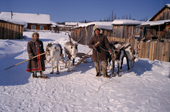 Andrei Konoriornok and his wife Marta, an Evenki couple, with their draft reindeer in the village of Surinda. Evenkiya, Central Siberia, Russia. 1997
