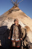 Raisa Tatko, an Even woman, standing infront of her yurt in Koryakia, Kamchatka, Siberia, Russia. 1999