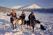 E'ven herders riding on reindeer at their winter pastures near Verkhoyansk. Yakutia, Siberia, Russia. 1999