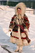 Maya Khudi, a Nenets woman wearing a traditional Yagushka (coat) from the late 19th Century, made from Reindeer & Arctic Fox skins. Yamal, Siberia, Russia.