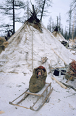 A Nenets baby, Vladic Serotetto, lies in a traditional cradle on a wooden sled at a reindeer herders' winter camp. Yamal, Western Siberia, Russia