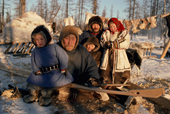 Nenets family, Grandfather, son & grand daughter at herders' winter camp. Yamal. Siberia. Russia.