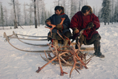 Mikhail Khudi (left) and Alexandre Serotetto, Nenets men, remove velvet from reindeer antlers. Yamal. Siberia. Russia.