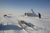 A Nenets reindeer herders' winter camp on the tundra near Tambey. Yamal Peninsula, Western Siberia, Russia