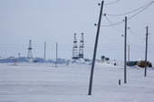 Gas drilling derricks and power cables at Sabetta in the Tambey gas field. Yamal Peninsula, Western Siberia, Russia