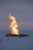 A gas flame near the gas workers' village of Sabetta in the South Tambey gas field. Yamal Peninsula, Western Siberia, Russia