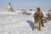 Puksy Yaungat, an elderly Nenets reindeer herder, at his winter camp on the tundra near Tambey. Yamal Peninsula, Western Siberia, Russia.