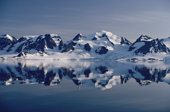 Mountains and Glaciers in the summer months reflected in an ice free sea. Prins Karls Forland. Spitsbergen.