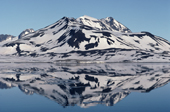 The spectacular mountain scenery and its reflection in Hornsund Fjord, Spitsbergen.