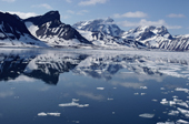Mountains reflected in ice free sea during the short  arctic summer. Hornsund Spitsbergen